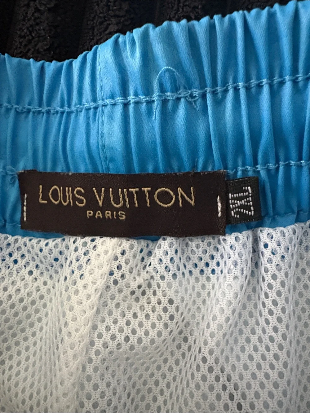 Louis Vuitton Men’s Sky Blue Monogram Swim Trunks with White Graphic